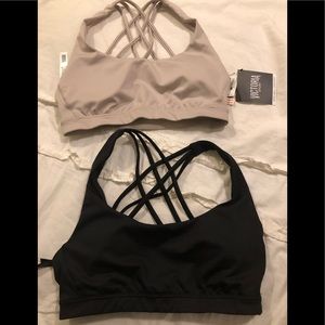 Victoria secret xs sports bra. One black and one light gray/lilac